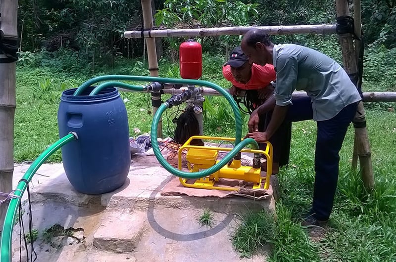 Ennos sunlight surface water pump connected to an Impact Pump water pump