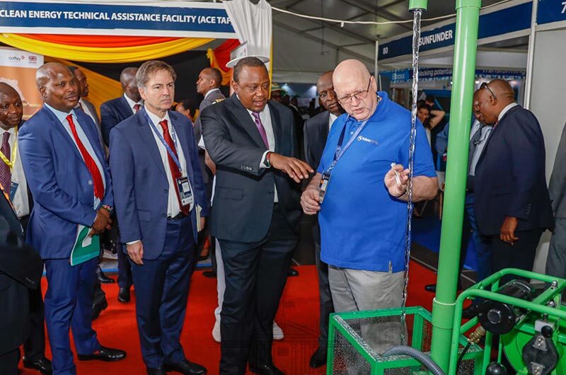 Solar irrigation partner, Futurepump, with their water pump and President Kenyatta